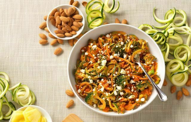 Spicy noodles with almond toppings, available at Noodles and Company fundraisers