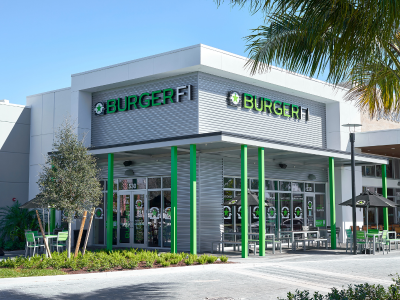 Exterior of a BurgerFi restaurant at daytime, where there are soon to be BurgerFi fundraisers